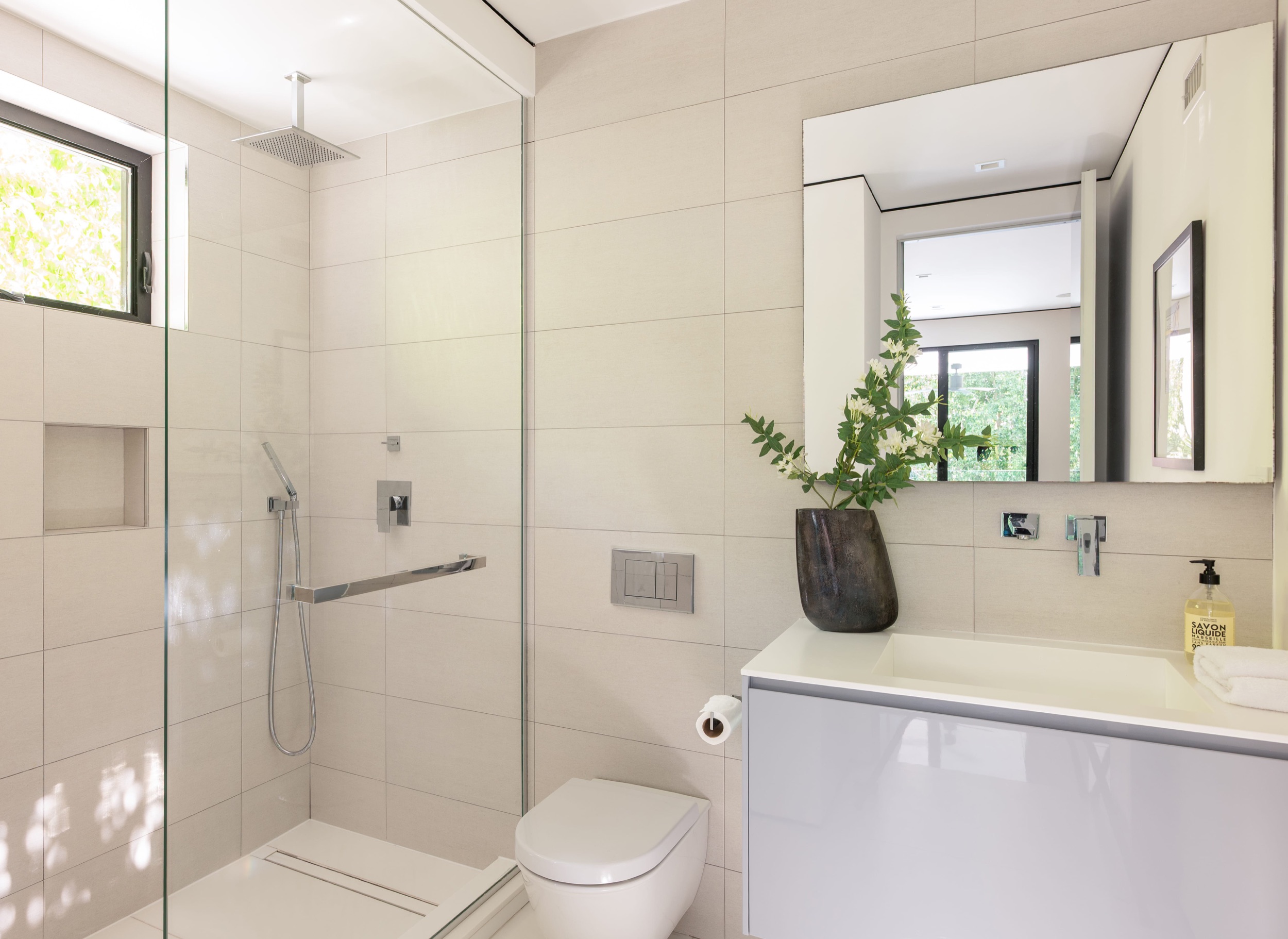 Bath serving the patio bedroom used as an office